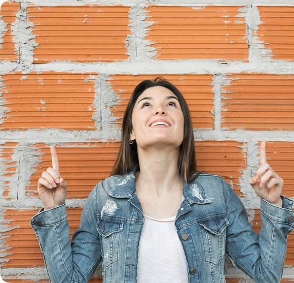 Woman with Vastu Bricks Wall